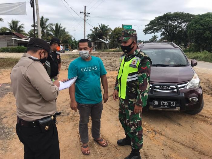 Putus Mata Rantai Covid 19, Anggota Koramil 09 Minas Jaya Gelar Sosialisasi Prokes